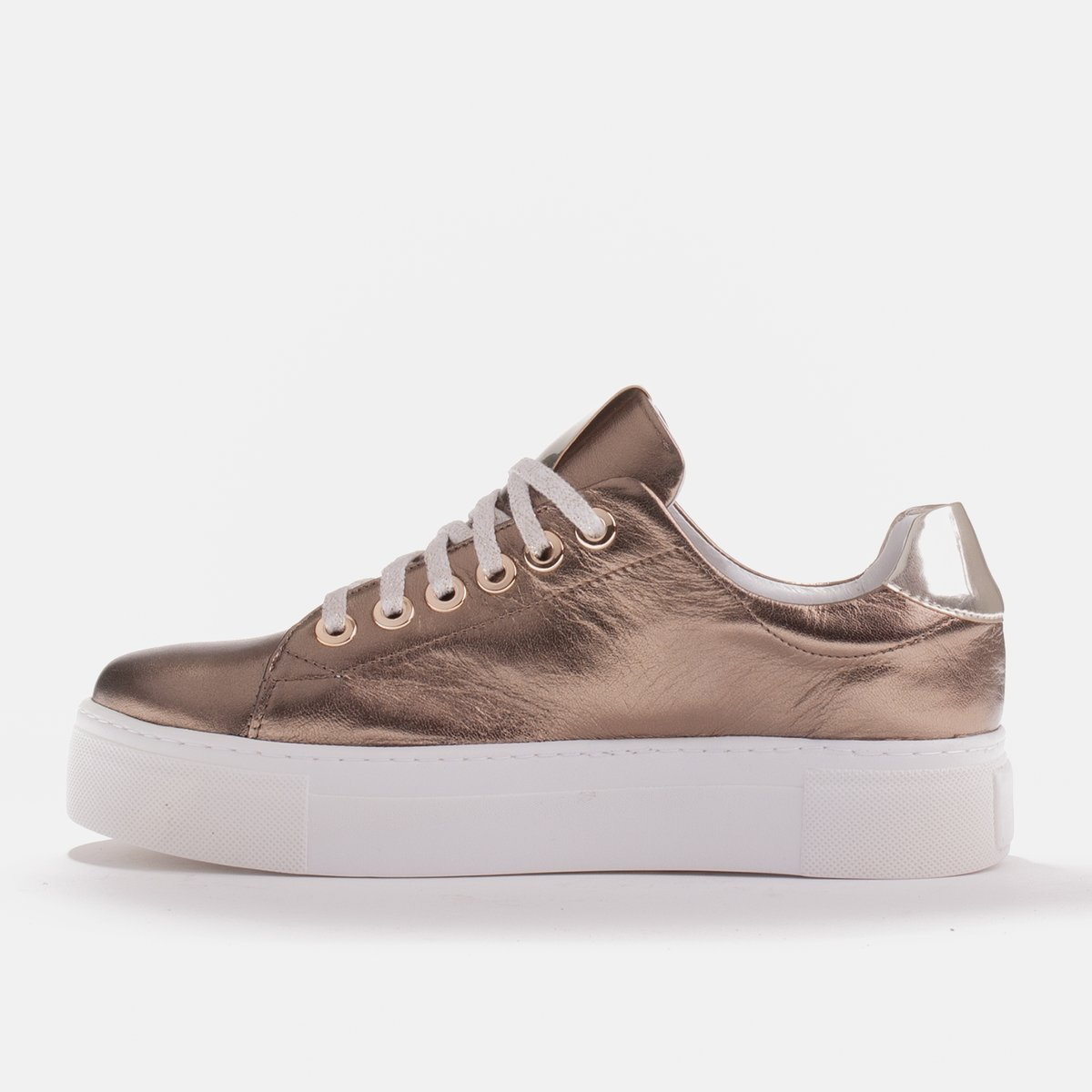 Women's sneakers made of genuine leather on a thick sole